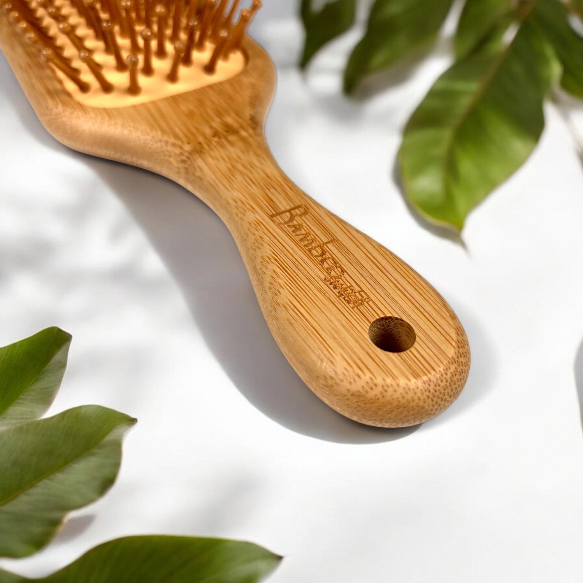 Handle close up of Bamboo Paddle Hair Brush For Kids - Bamboo Switch