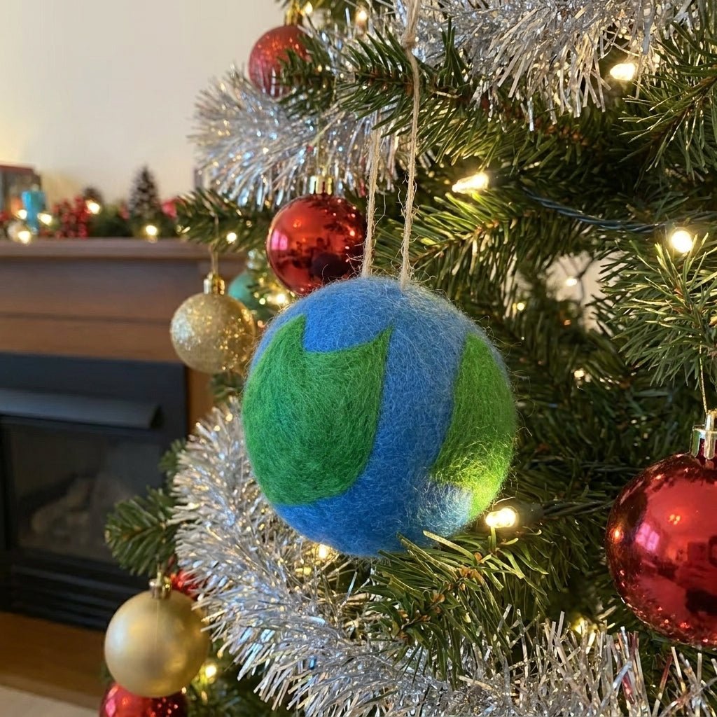 Christmas tree with colorful ornaments including a blue and green ball ornament.