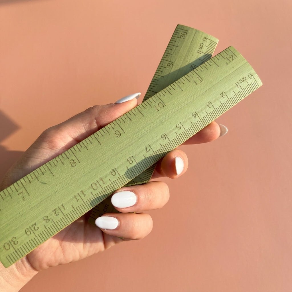 Hand Holding Premium Bamboo Ruler