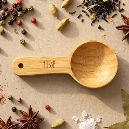 Bamboo tablespoon surrounded by whole spices | Bamboo Switch