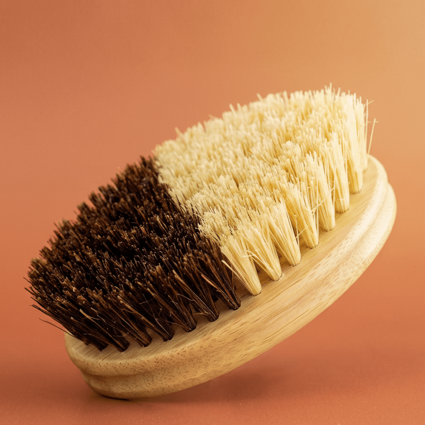 A multipurpose bamboo brush isolated against a pleasant, warm background | Bamboo Switch
