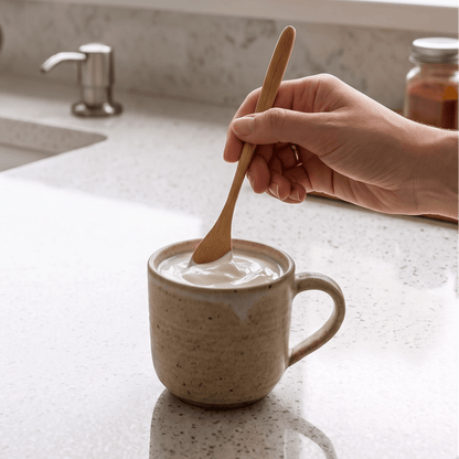 bamboo stir spoon mixing honey into a mug full of yogurt | Bamboo Switch