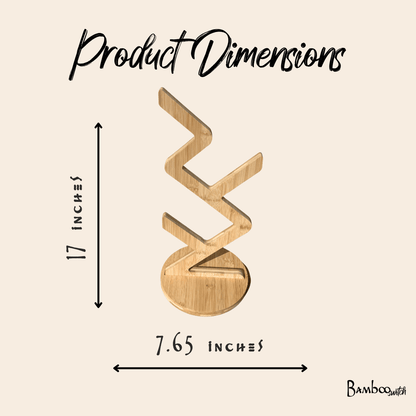 Product dimensions diagram showing a bamboo toilet paper stand on a beige background, with text indicating 17 inches in height and 7.65 inches in width by Bamboo Switch®