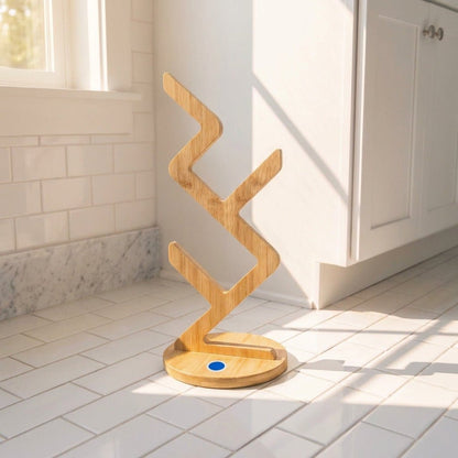 A modern bamboo toilet paper stand with a zigzag design by Bamboo Switch®