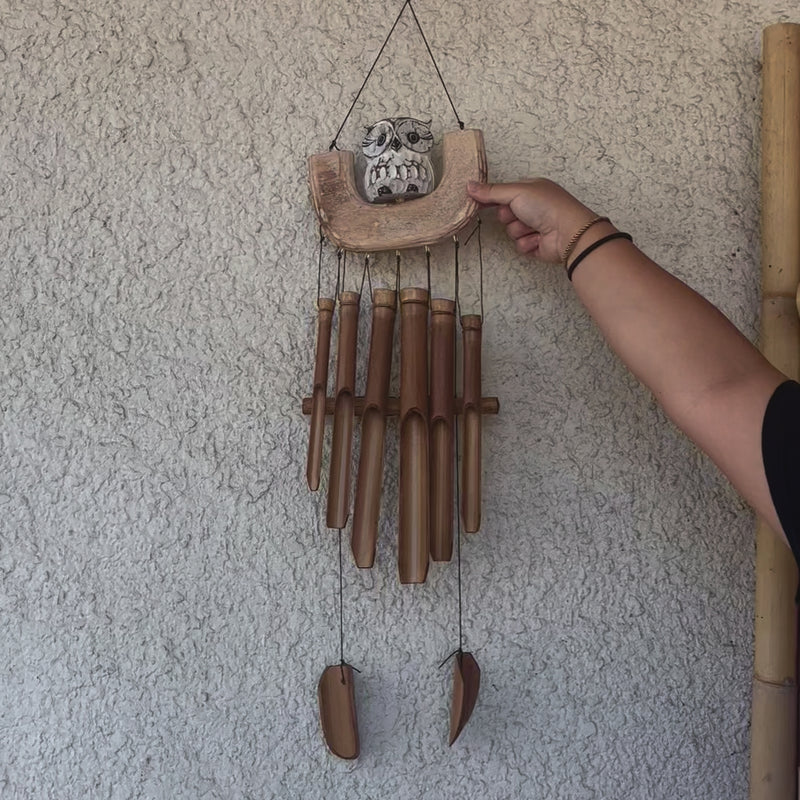 White Owl Bamboo Wind Chime on a swing