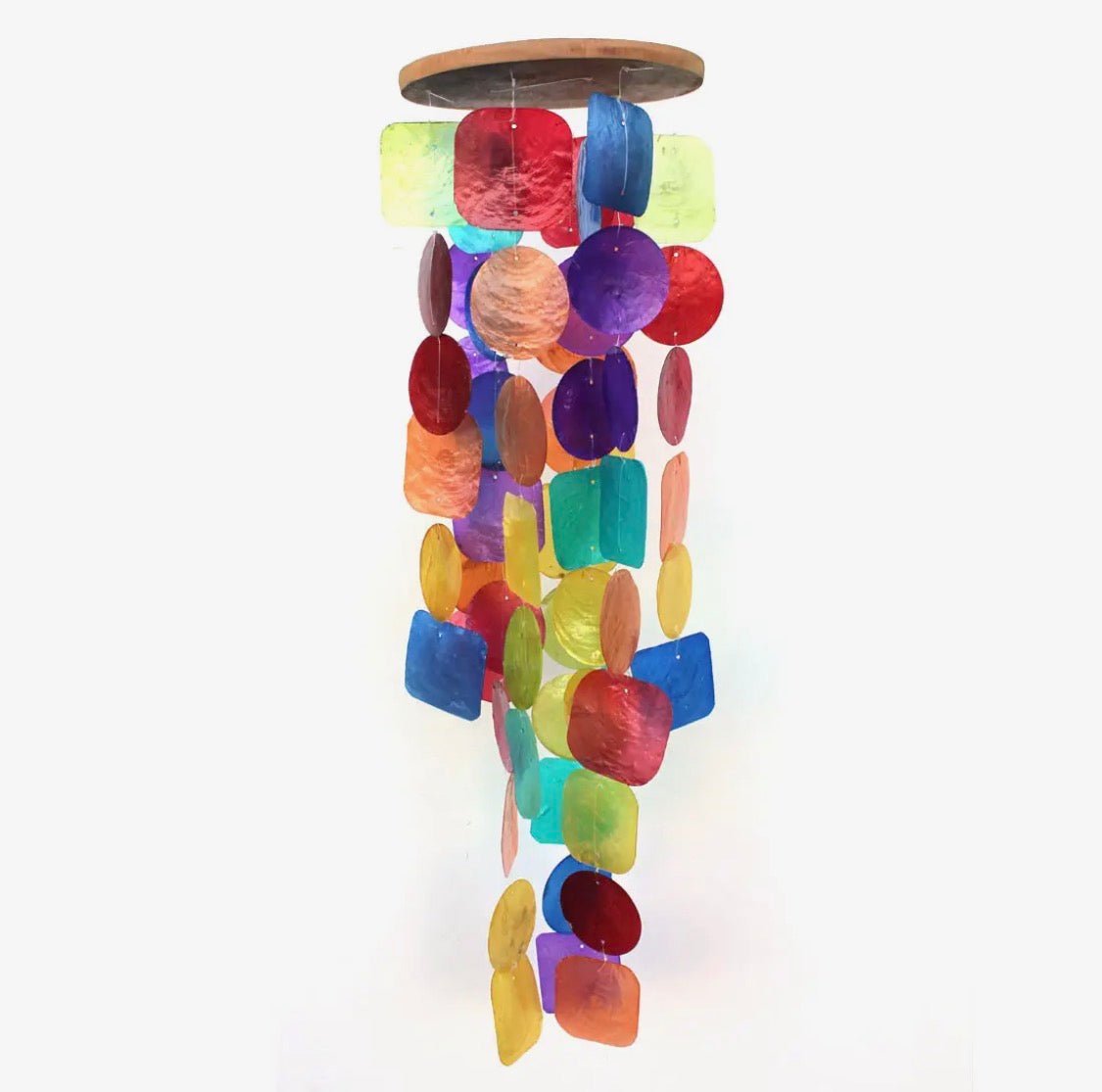 A multicolor capiz shell wind chime hanging from a round wooden top, featuring translucent discs in red, orange, yellow, green, blue, and purple on a white background.